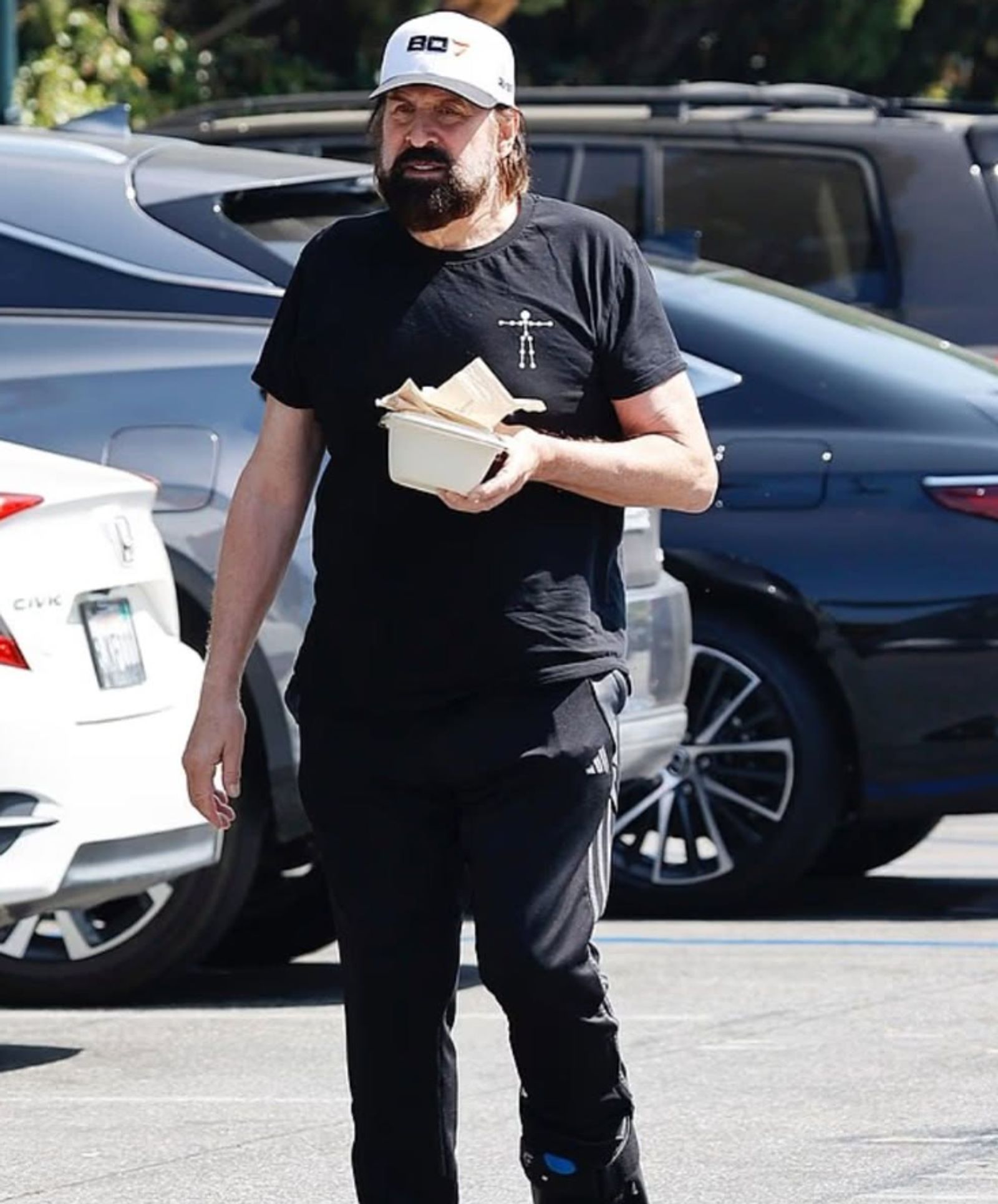 A legendary movie villain from Fargo and The Big Lebowski appeared almost unrecognizable during a rare outing in Beverly Hills. Who is he?