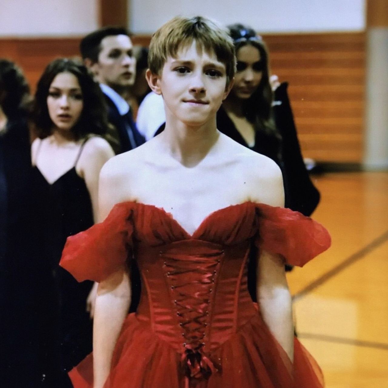 My Son Walked Into Graduation Wearing a Red Dress — The Reason Silenced the Entire Room