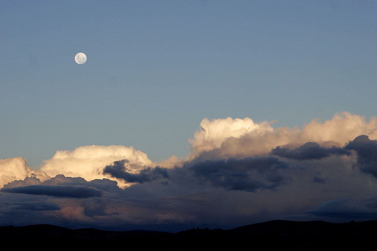 Moon over cumulus